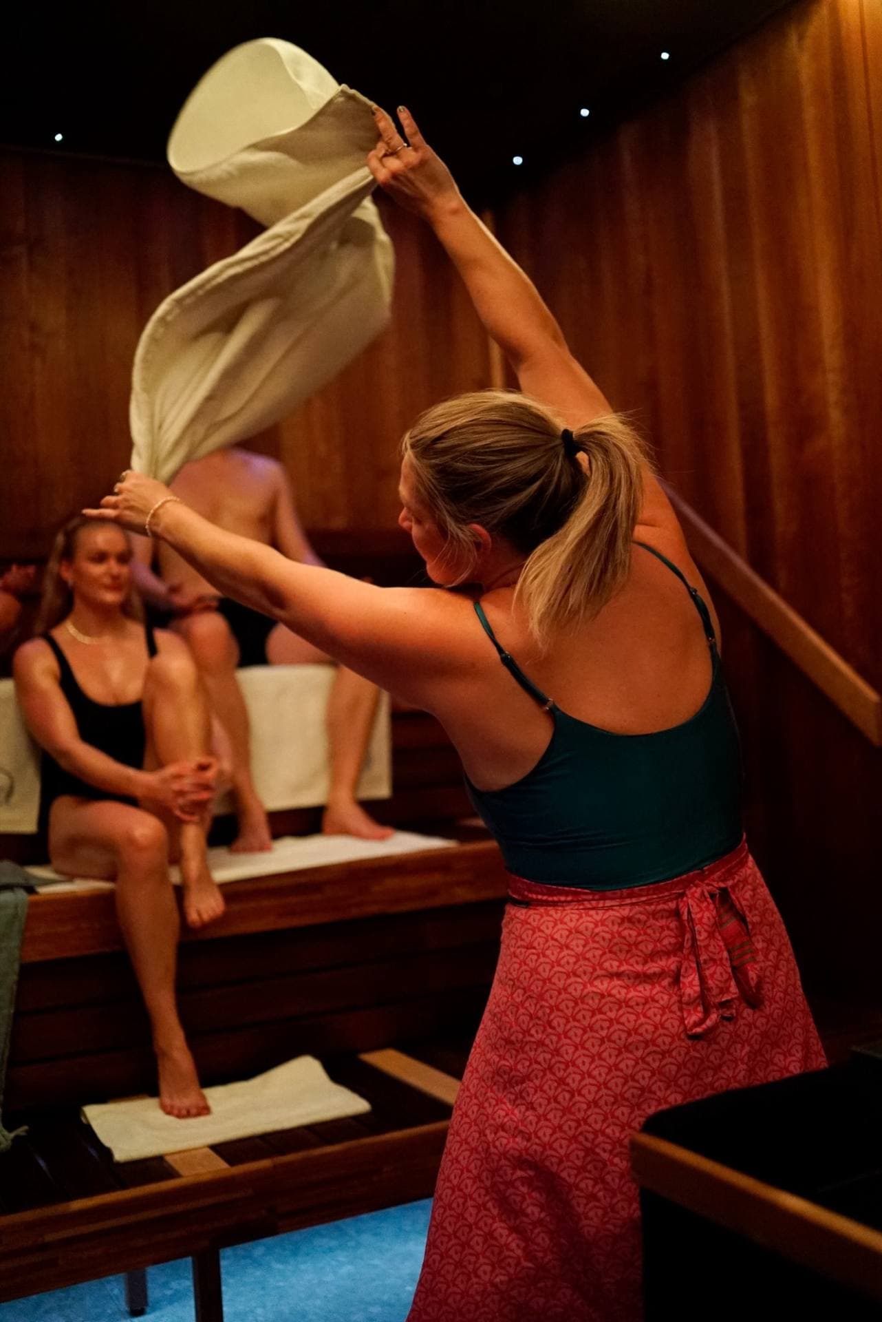 A gusmester moving the heat with a fan